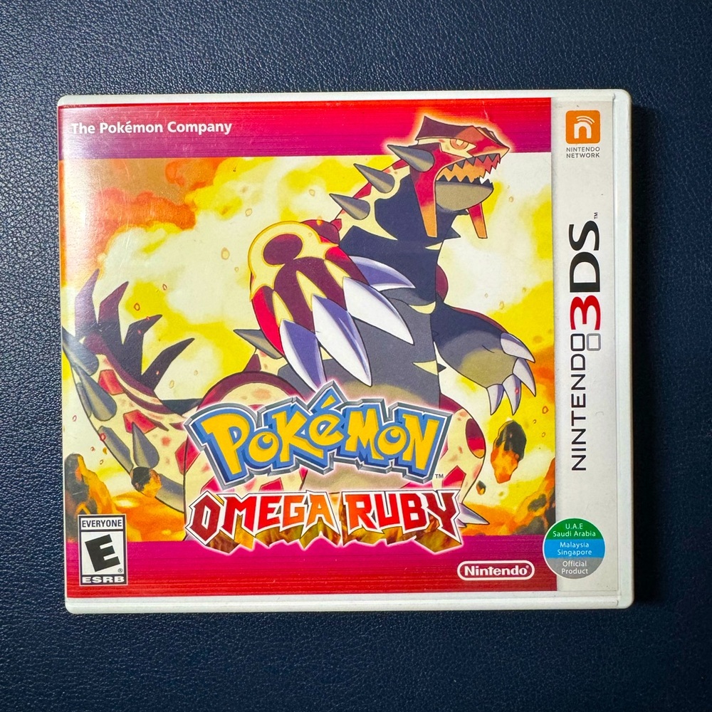 Pokémon Omega Ruby in box with manuals.